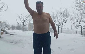 Termometreler sıfırın altında, o üstsüz karın altında!