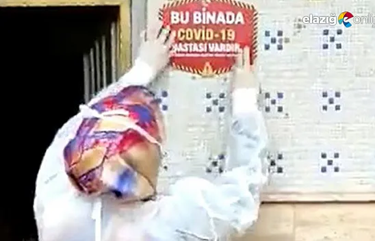 Covid-19 vakası çıkan evlere uyarı etiketi