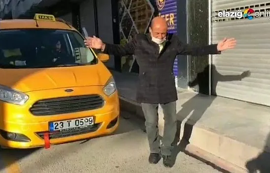 Müziğin ritmine kendini kaptıran taksici gülümsetti