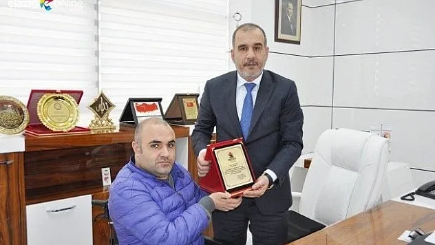 MİDDER'den TSO Başkanı Alan'a Plaket