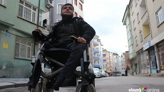Engelini aşan Okan'ın bir günü