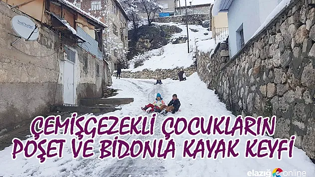 Çemişgezekli çocukların poşet ve bidonla kayak keyfi