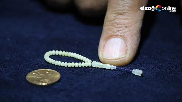 50 milyon yıllık kehribardan dünyanın en küçük tespihini yaptı