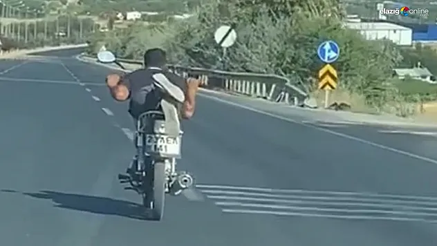 Canını hiçe saydı, motosikleti yatarak sürdü!