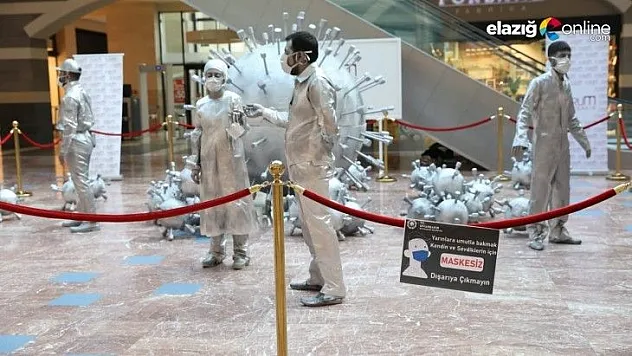 Canlı heykeller korona virüse karşı uyardı