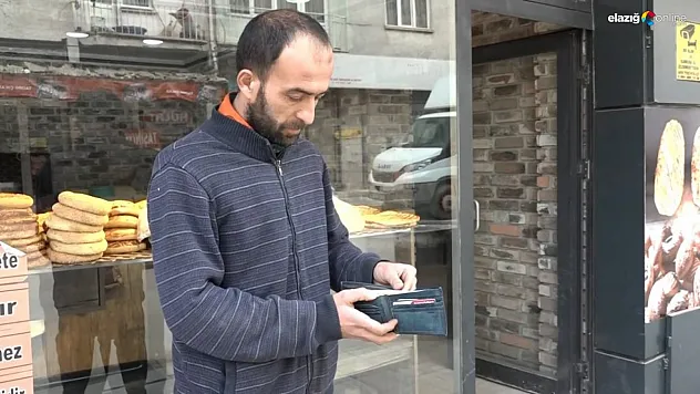 Elazığ'da bir esnaf yolda bulduğu para dolu cüzdanın sahibini arıyor
