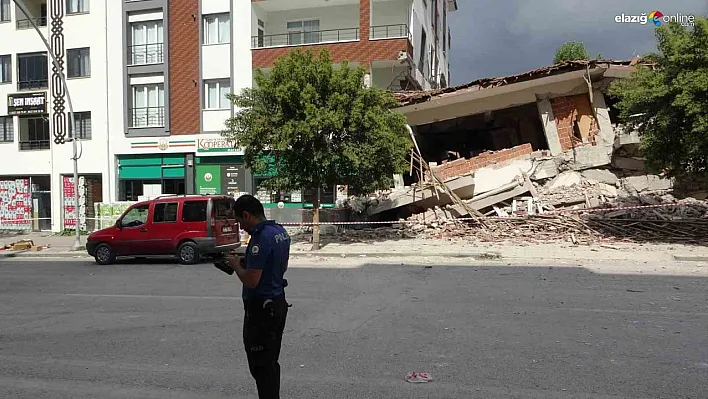 Malatya'da ağır hasarlı bina sağlam binanın üzerine çöktü