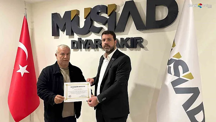 MÜSİAD Başkanı Bozkuş'a anlamlı plaket!