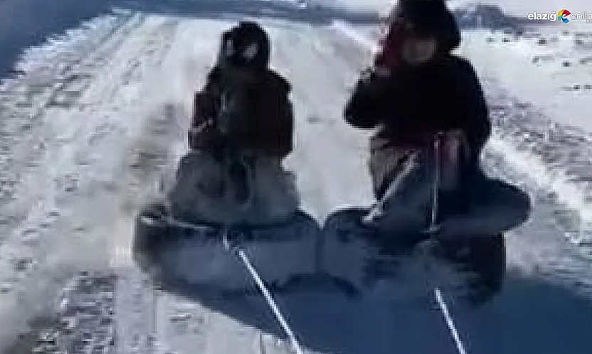 Elazığ'da tehlikeli ama eğlenceli anlar: Otomobil arkasında kar keyfi